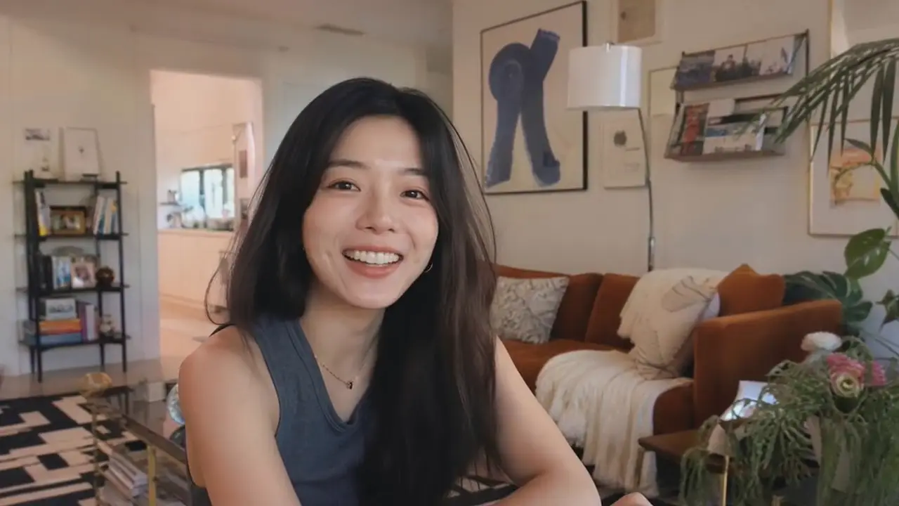 Kling video image to video - a young woman introduces herself to camera in her living room